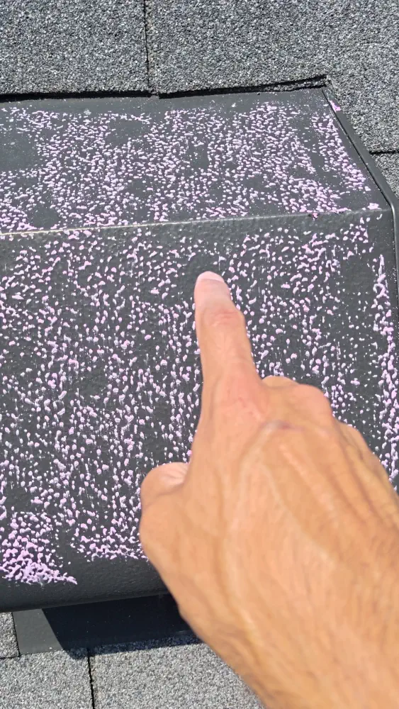 StormVets team providing a free roof inspection showing visible damage to soft metals on the roof in Fort Worth