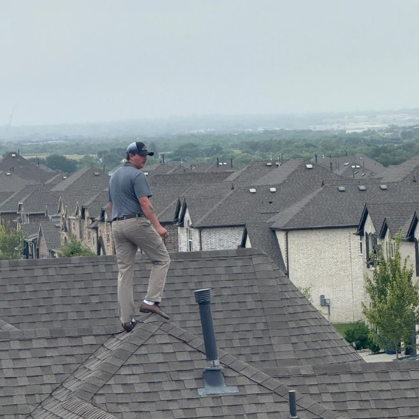 StormVets team performing a free roof inspection in Prosper, TX