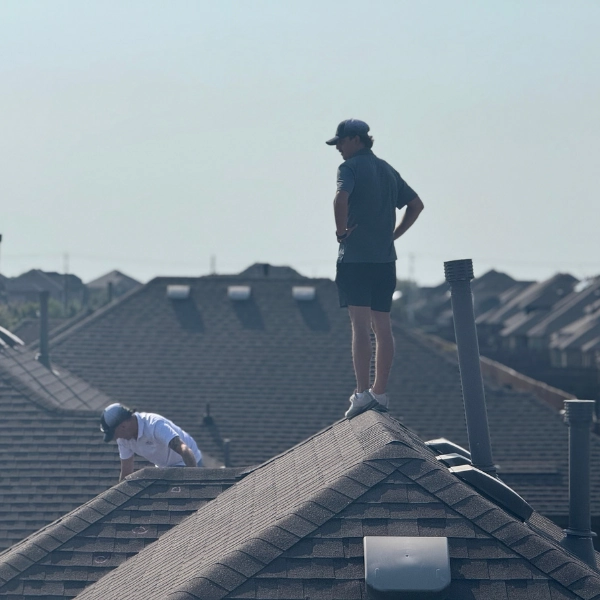 StormVets team performing a free roof inspection in Aubrey, TX
