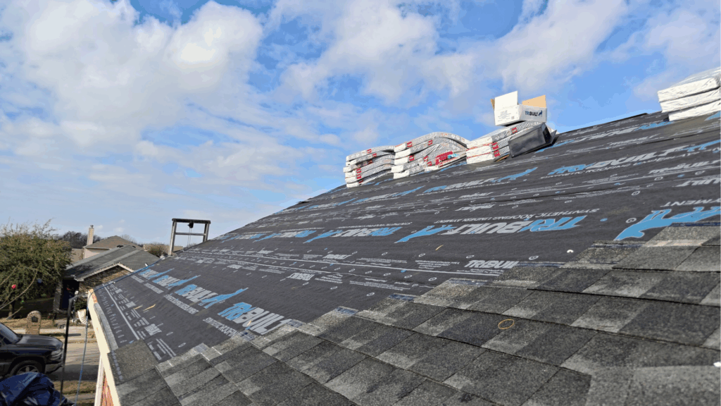 Close up of a class 4 impact resistant shingle provided by GAF and underlayment
